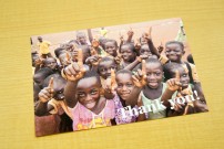 ポストカードにはガーナの子どもたちの写真が使われています